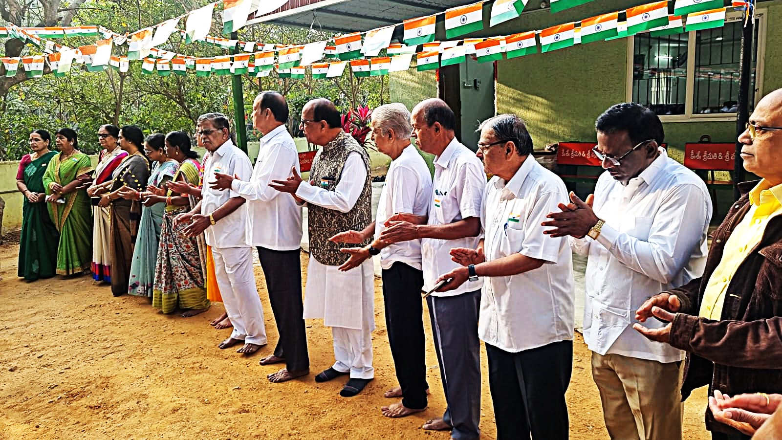 14 All the senior citizen members claping with unbounded joy after unfurling of National flag .jpeg